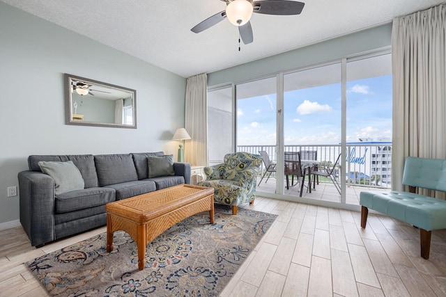 1515 SE Miracle Strip Pkwy Unit 613, Fort Walton Beach, FL 32548 - living room featuring ceiling fan and light wood finished floors