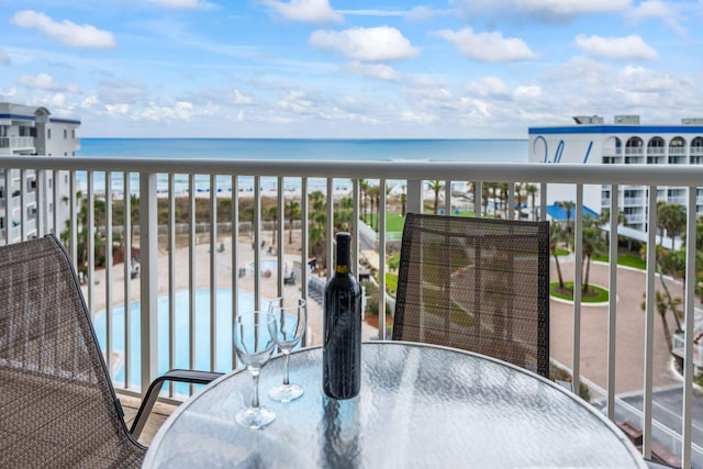 1515 SE Miracle Strip Pkwy Unit 613, Fort Walton Beach, FL 32548 - balcony featuring outdoor dining area, a water view, and view of pool area