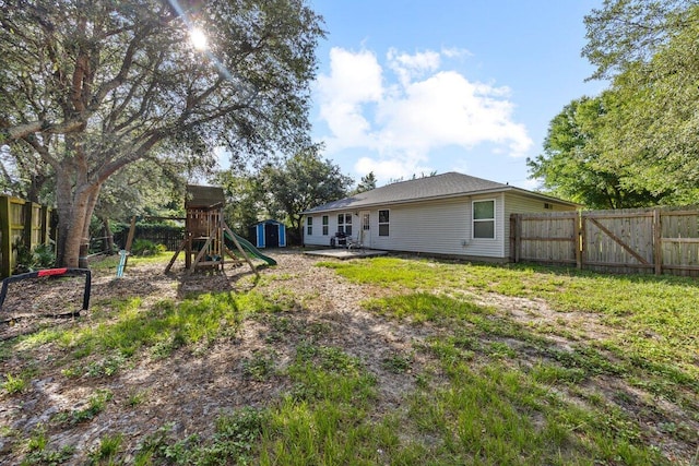 4887 Martina Way, Gulf Breeze, FL 32563 - fenced backyard featuring a playground