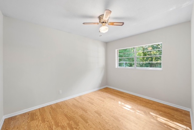 814 Tuxedo Dr, Fort Walton Beach, FL 32547 - spare room featuring light wood-style floors, baseboards, and a ceiling fan