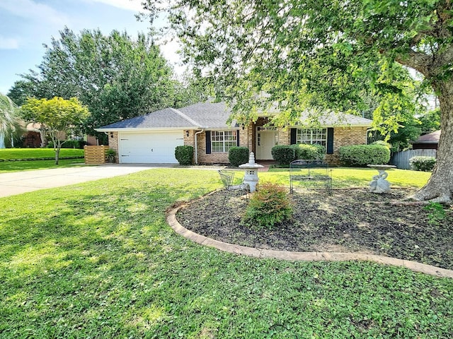 4868 Orlimar St, Crestview, FL 32536 - single story home featuring brick siding, an attached garage, and driveway