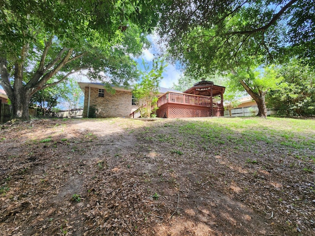 4868 Orlimar St, Crestview, FL 32536 - fenced backyard with a wooden deck