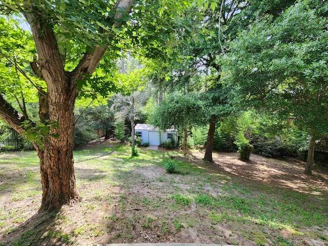 4868 Orlimar St, Crestview, FL 32536 - view of yard featuring a storage shed