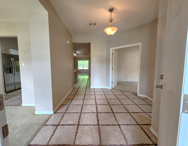 4868 Orlimar St, Crestview, FL 32536 - unfurnished room featuring a textured ceiling and light tile patterned floors