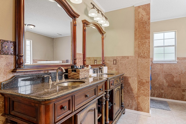 1190 Witshire Ct, Fort Walton Beach, FL 32547 - full bath with tile walls, a textured ceiling, crown molding, double vanity, and tile patterned flooring