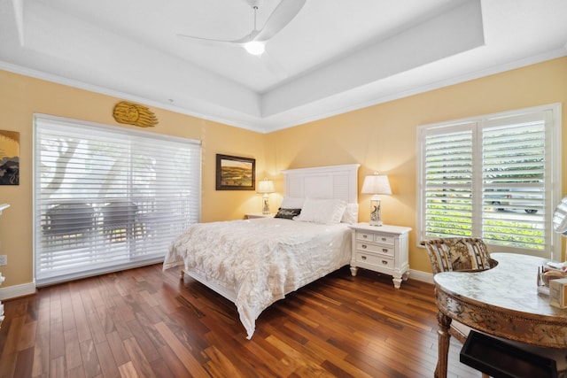 770 Harbor Blvd Unit 1J, Destin, FL 32541 - bedroom with a tray ceiling, access to exterior, dark wood-style flooring, and crown molding