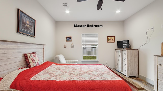 148 Engelbrecht Rd, Defuniak Springs, FL 32433 - bedroom with wood finished floors, recessed lighting, and a ceiling fan