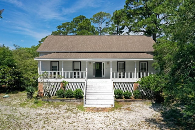 84 Old Miller Pl, Santa Rosa Beach, FL 32459 - view of front of property with a porch, stairway, and a shingled roof