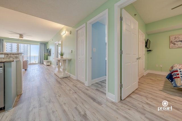 112 Seascape Dr Unit 704, Miramar Beach, FL 32550 - corridor featuring light wood finished floors and baseboards