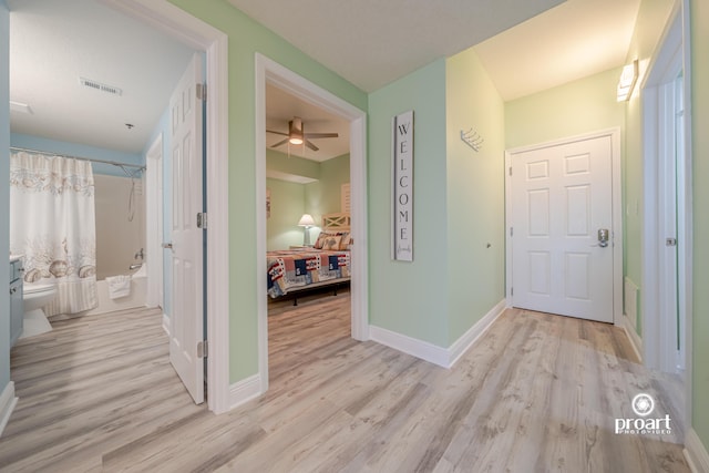 112 Seascape Dr Unit 704, Miramar Beach, FL 32550 - corridor with wood finished floors and baseboards