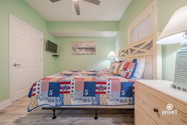 112 Seascape Dr Unit 704, Miramar Beach, FL 32550 - bedroom featuring wood finished floors, ceiling fan, and baseboards