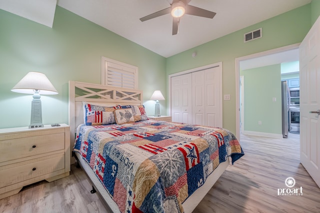 112 Seascape Dr Unit 704, Miramar Beach, FL 32550 - bedroom with light wood finished floors, a closet, baseboards, and a ceiling fan