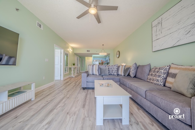 112 Seascape Dr Unit 704, Miramar Beach, FL 32550 - living room featuring light wood-style floors, ceiling fan, and baseboards