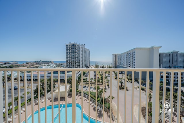 112 Seascape Dr Unit 704, Miramar Beach, FL 32550 - balcony with view of pool, a view of city, and a water view