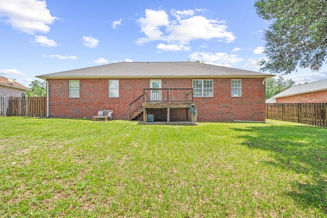 138 Conquest Ave, Crestview, FL 32536 - back of house featuring stairway, a wooden deck, and brick siding