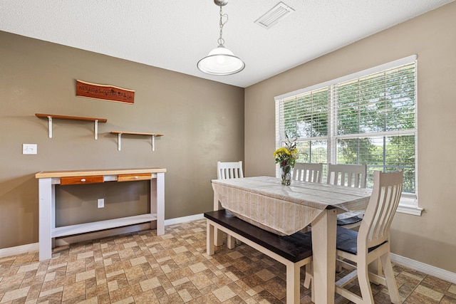 138 Conquest Ave, Crestview, FL 32536 - dining room featuring baseboards