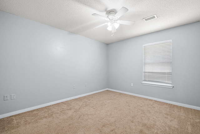 138 Conquest Ave, Crestview, FL 32536 - carpeted empty room featuring ceiling fan, baseboards, and a textured ceiling