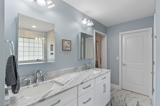7302 Manatee St, Navarre, FL 32566 - full bath featuring double vanity, marble look tiles, and baseboards