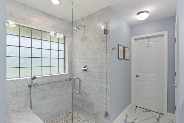 7302 Manatee St, Navarre, FL 32566 - bathroom with a shower stall, marble finish floors, and baseboards