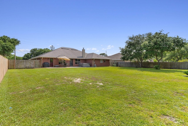 7302 Manatee St, Navarre, FL 32566 - view of yard with a patio