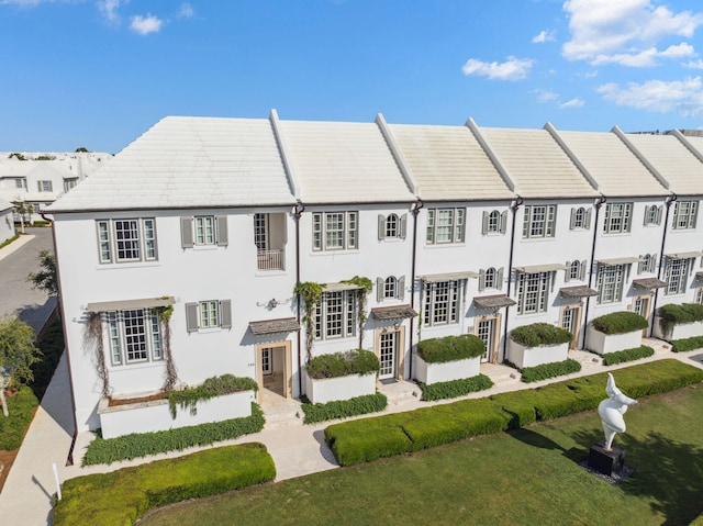 132 N Somerset St, Alys Beach, FL 32461 - view of front of house with stucco siding