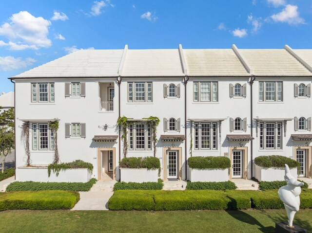 132 N Somerset St, Alys Beach, FL 32461 - view of front of home with stucco siding