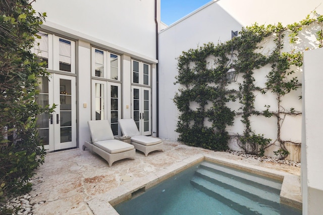 132 N Somerset St, Alys Beach, FL 32461 - view of pool featuring french doors and a patio area