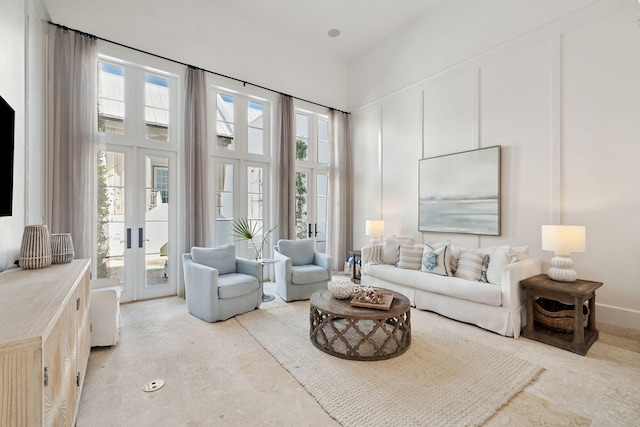 132 N Somerset St, Alys Beach, FL 32461 - living room featuring french doors, healthy amount of natural light, and a high ceiling
