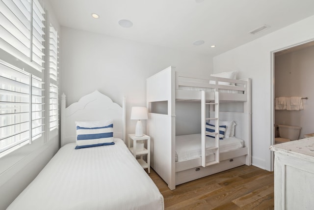 132 N Somerset St, Alys Beach, FL 32461 - bedroom with multiple windows, wood finished floors, and recessed lighting