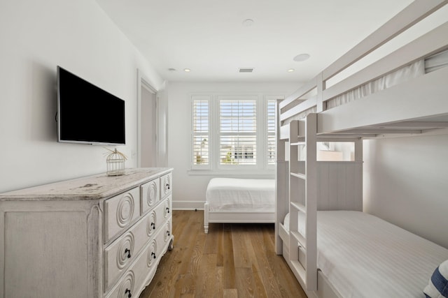 132 N Somerset St, Alys Beach, FL 32461 - bedroom with wood finished floors and recessed lighting