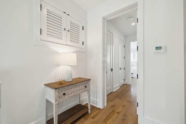 132 N Somerset St, Alys Beach, FL 32461 - corridor featuring light wood-style floors and baseboards