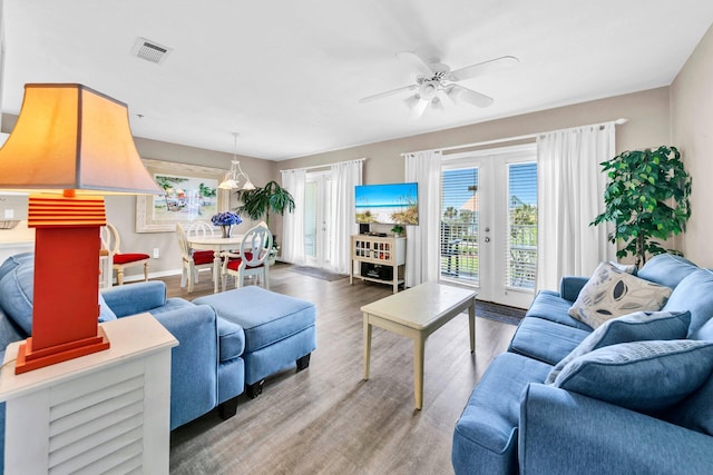 144 Spires Ln Unit 202, Santa Rosa Beach, FL 32459 - living area featuring wood finished floors, ceiling fan, and baseboards