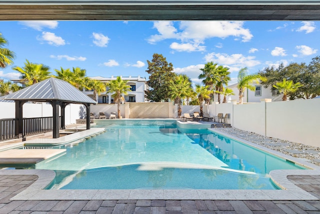 89 Shirah St, Destin, FL 32541 - view of pool featuring a gazebo, a fenced backyard, and a patio area
