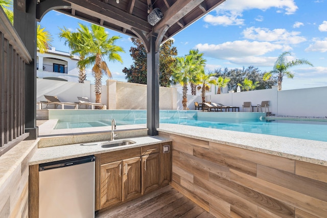 89 Shirah St, Destin, FL 32541 - view of pool featuring a sink, a fenced backyard, and exterior kitchen