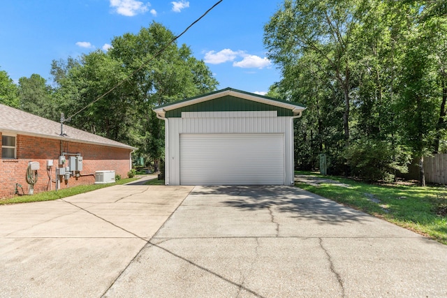1184 Blackberry Cir, Baker, FL 32531 - detached garage featuring central air condition unit