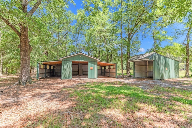 1184 Blackberry Cir, Baker, FL 32531 - garage featuring a detached garage