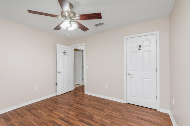 1184 Blackberry Cir, Baker, FL 32531 - unfurnished bedroom featuring wood finished floors, baseboards, and ceiling fan