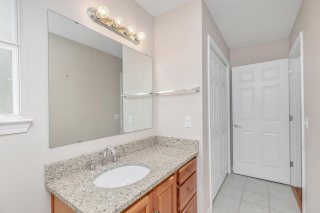 1184 Blackberry Cir, Baker, FL 32531 - bathroom with vanity and tile patterned floors