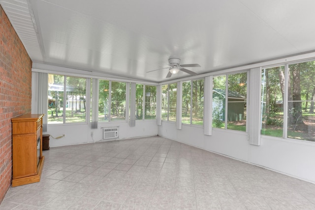 1184 Blackberry Cir, Baker, FL 32531 - unfurnished sunroom with brick wall, a wall unit AC, and tile patterned flooring