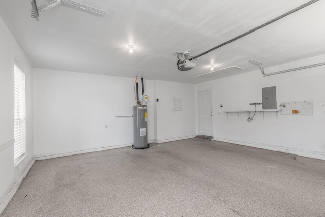 1184 Blackberry Cir, Baker, FL 32531 - garage featuring electric panel, a garage door opener, and water heater