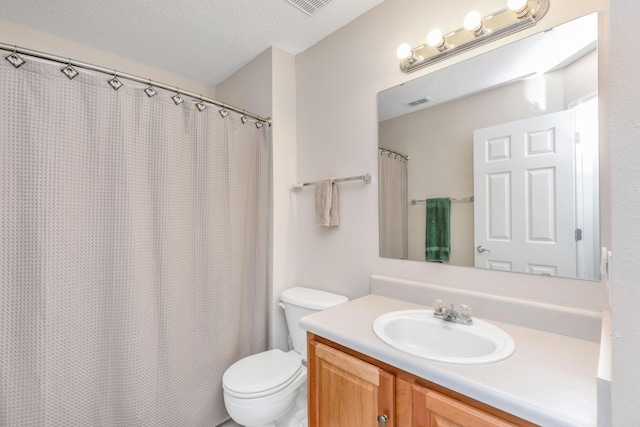 1184 Blackberry Cir, Baker, FL 32531 - bathroom featuring vanity, toilet, a textured ceiling, and a shower with curtain