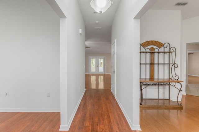 1184 Blackberry Cir, Baker, FL 32531 - hallway with wood finished floors and baseboards