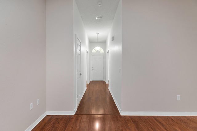 1184 Blackberry Cir, Baker, FL 32531 - hall with wood finished floors and baseboards