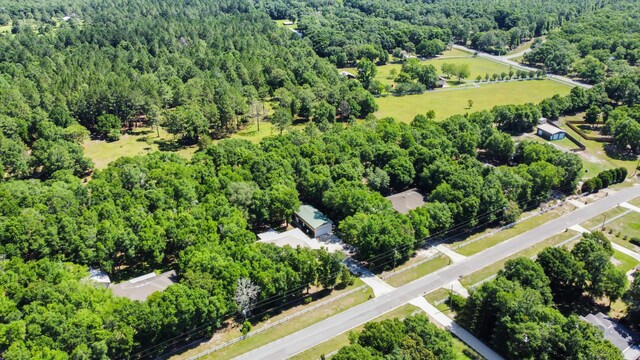 1184 Blackberry Cir, Baker, FL 32531 - drone / aerial view of a heavily wooded area