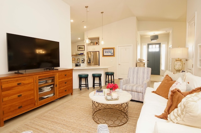 14 Cool Breeze, Freeport, FL 32439 - living area with vaulted ceiling, light wood-style flooring, and recessed lighting