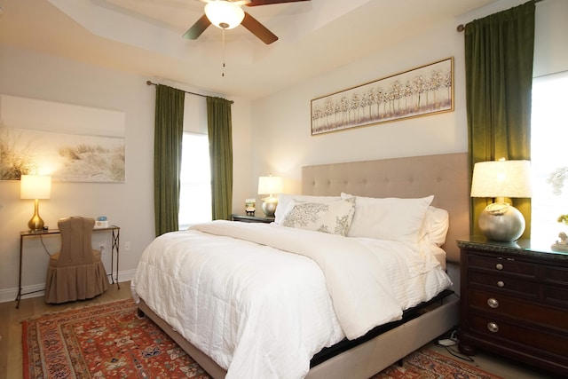 14 Cool Breeze, Freeport, FL 32439 - bedroom featuring wood finished floors, ceiling fan, and baseboards