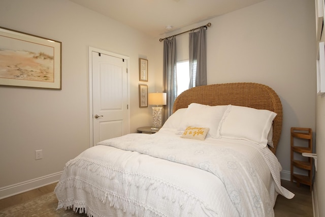 14 Cool Breeze, Freeport, FL 32439 - bedroom featuring baseboards and wood finished floors