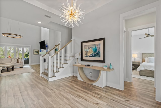 276 W Lafayette Rd, Inlet Beach, FL 32461 - entryway featuring wood finished floors, baseboards, stairs, a chandelier, and recessed lighting