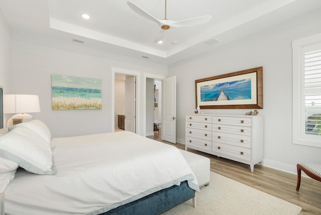 276 W Lafayette Rd, Inlet Beach, FL 32461 - bedroom featuring wood finished floors, baseboards, recessed lighting, a tray ceiling, and ceiling fan