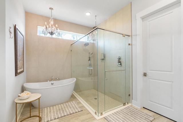 276 W Lafayette Rd, Inlet Beach, FL 32461 - bathroom with a stall shower, a freestanding tub, and a chandelier